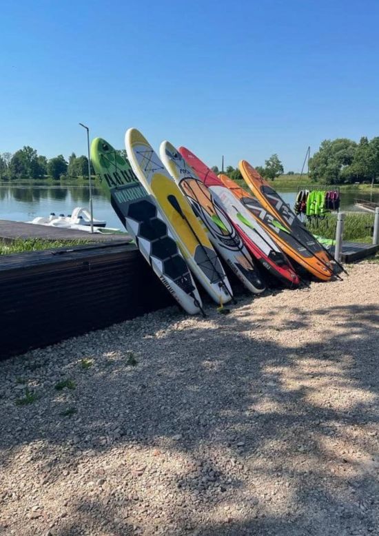 Sunrise on a SUP board at the Rundāle Watermill Lake