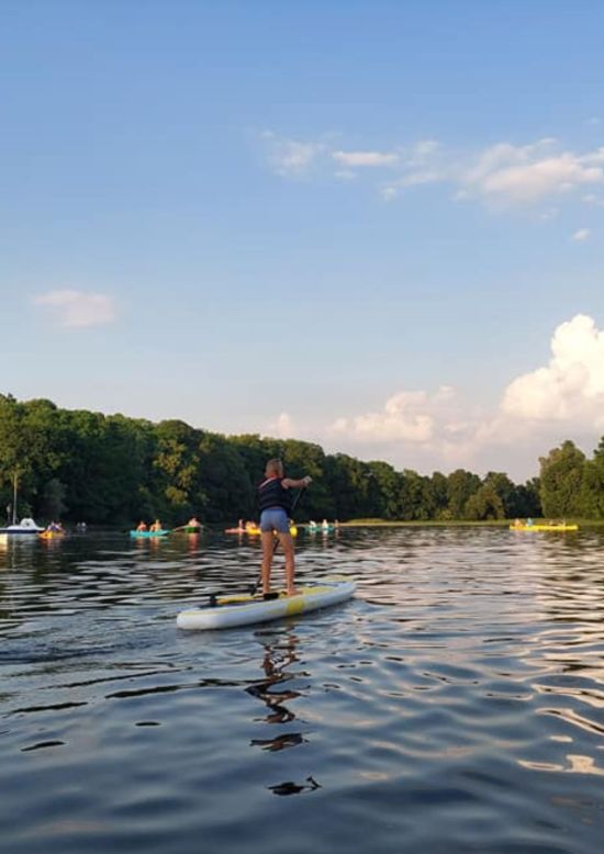 Sunrise on a SUP board at the Rundāle Watermill Lake